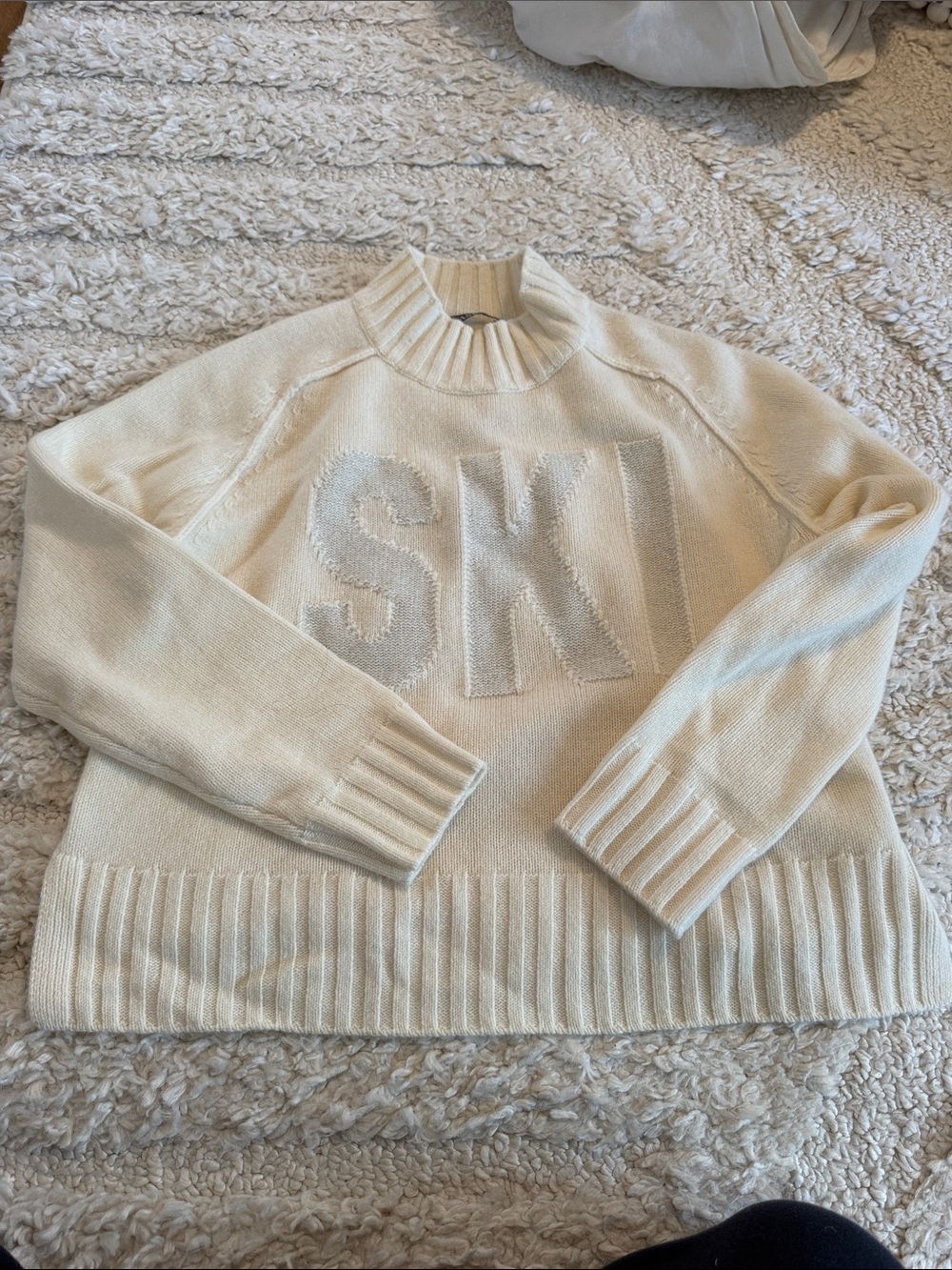Cozy Cream Ribbed Mock-Neck Sweater with Raised 'SKI' Detail